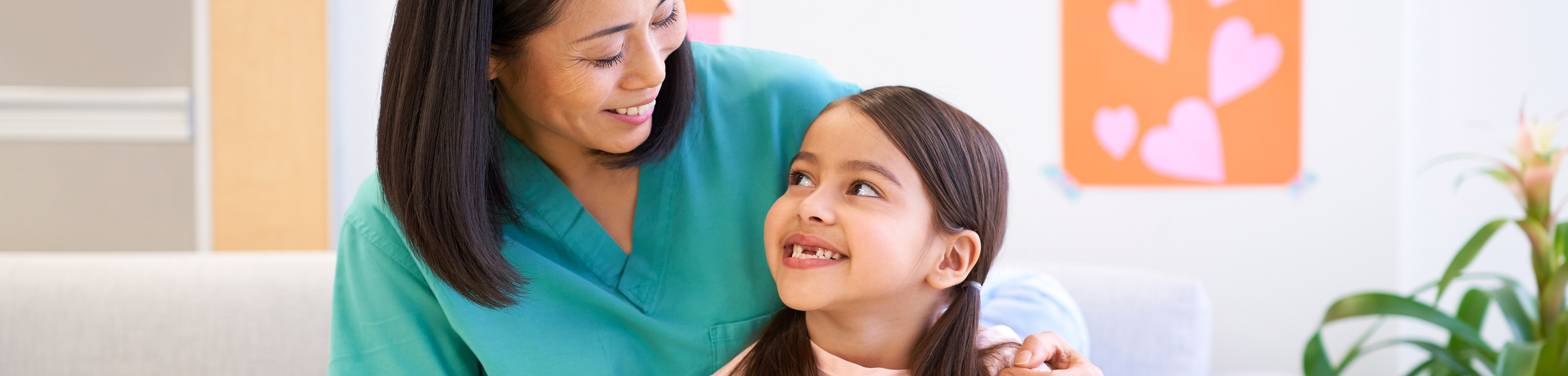 Caregiver with Pediatric Patient